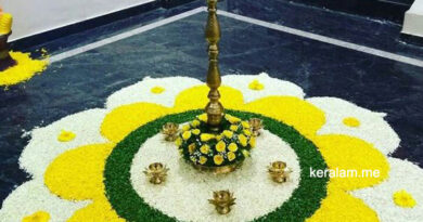 onam pookalam 2021 with white and yellow flower